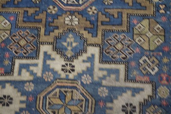 A Caucasian blue ground rug 135 x 90cm